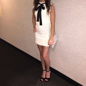 White and black tweed dress with black bow